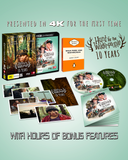 A 4K Ultra HD movie package set for 'Hunt for the Wild-people 10 Years' shown on a pale mint background, including a box, 4K Blu-ray case, original book by Barry Crump, extra photos and a booklet. Text highlights 'Presented in 4K for the first time' and 'With hours of bonus features'.
